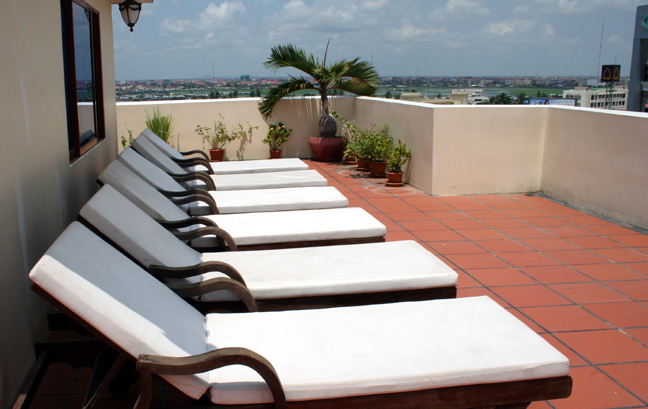 Cityscape view from a rooftop terrace